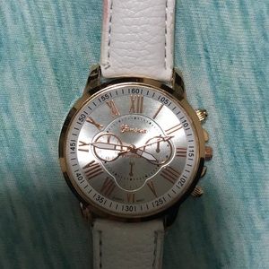 White and rose gold watch